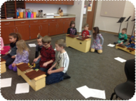Children playing xylophones